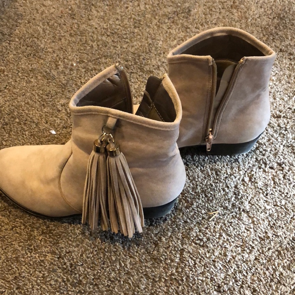 Brown tassel boots size 8.